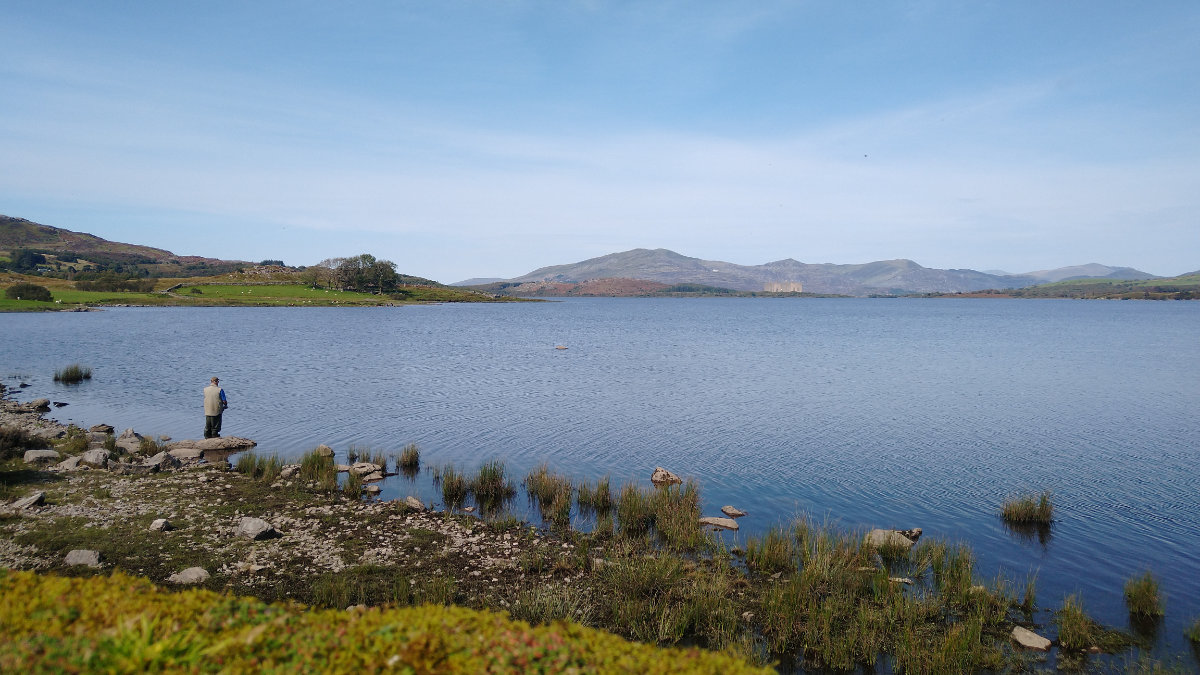 Fisherman enjoying a day at Llyn Trawsfynydd